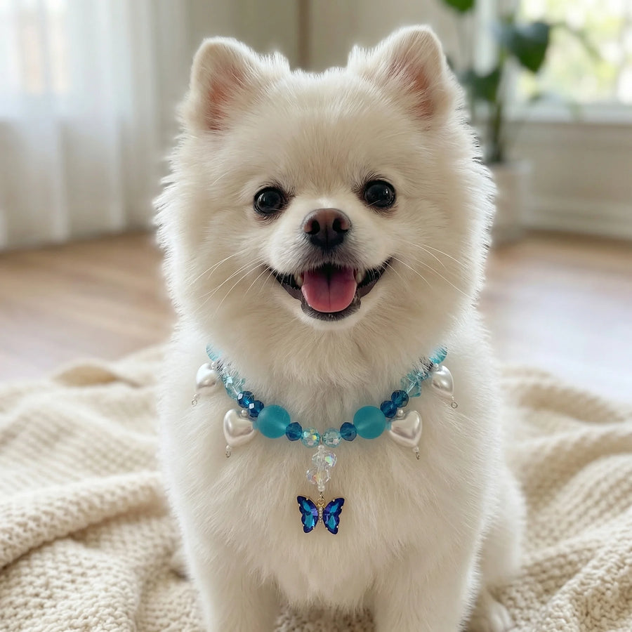 Vanderclix Butterfly Pendant Necklace Blue Pomeranian Seated