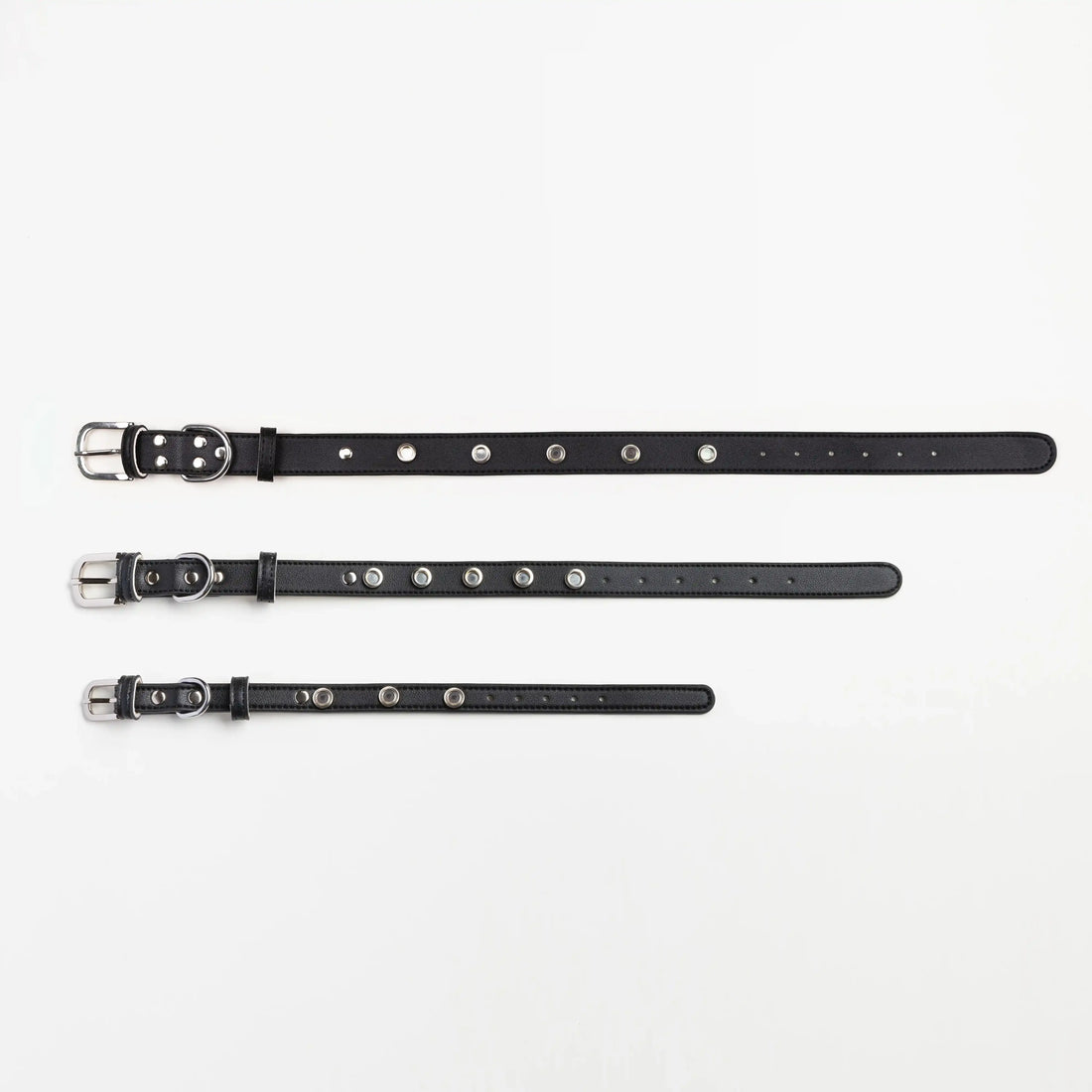Three sizes of Vanderclix Obsidian black Signature Base Collar on white