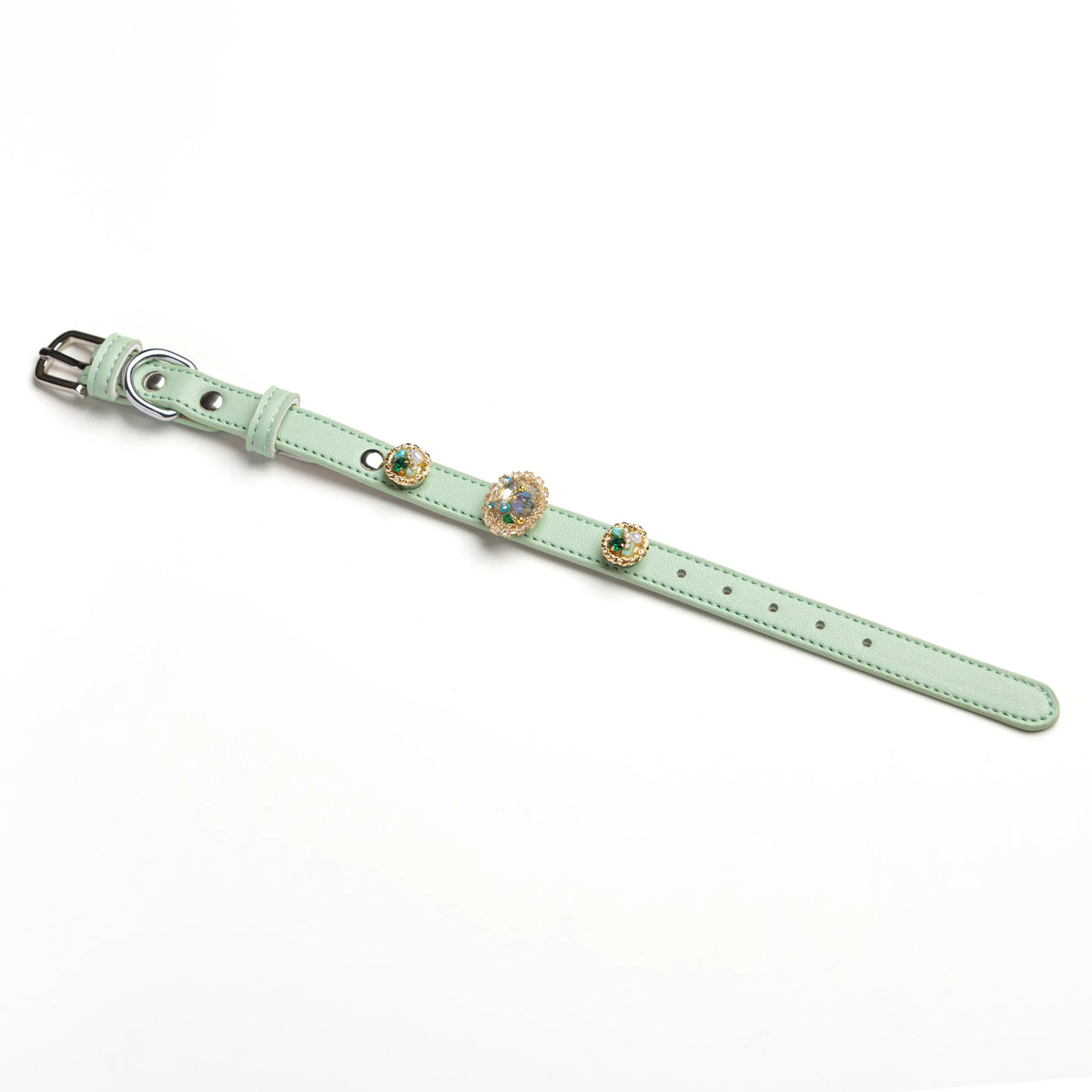 Vintage Bloom snap-on charm set on Sage green leather collar by Vanderclix, angled view.