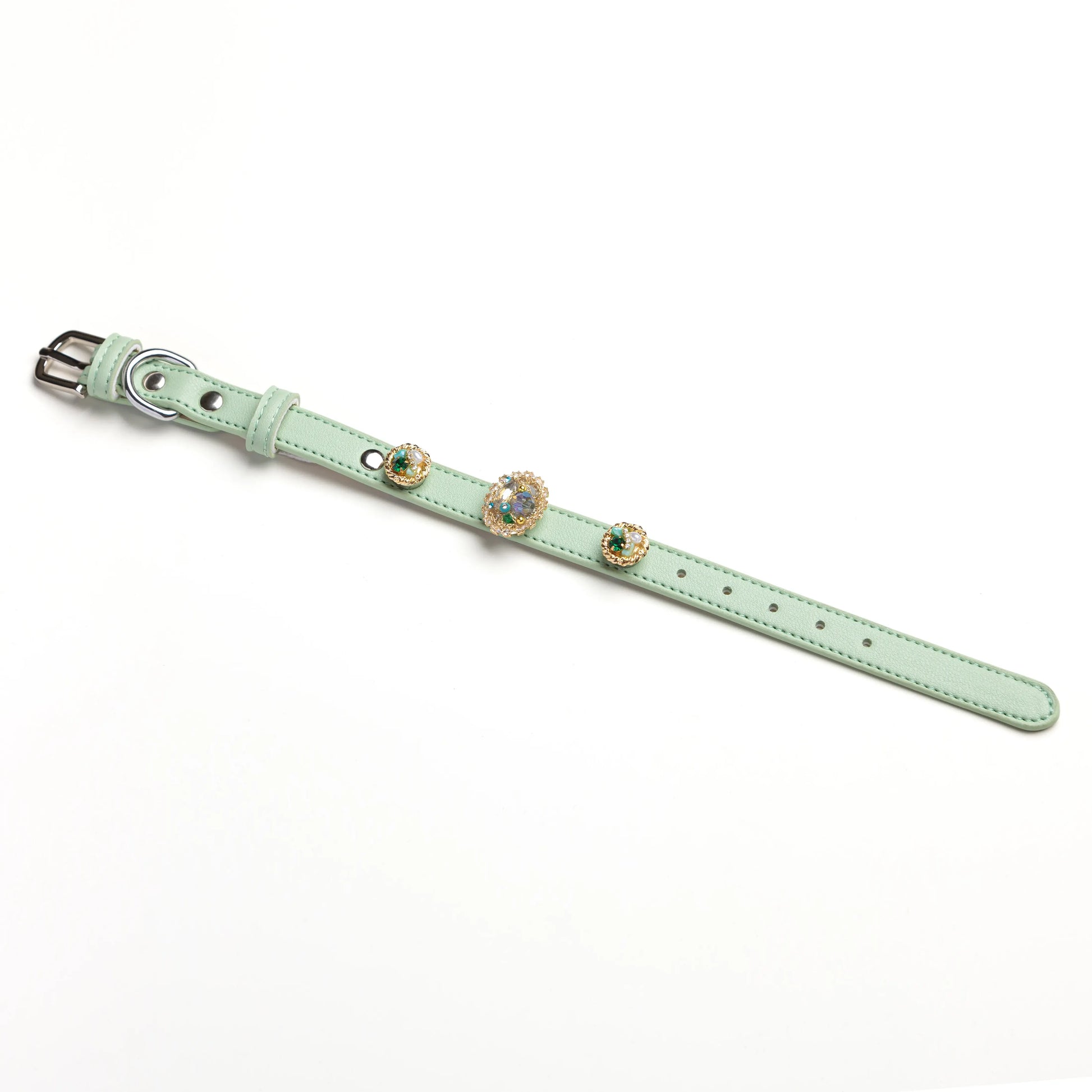 Vintage Bloom snap-on charm set on Mist green leather collar by Vanderclix&Co., angled view.