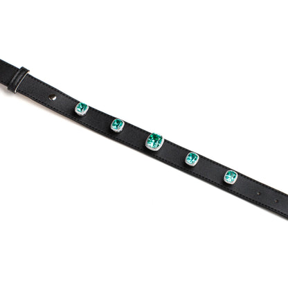 Black leather dog collar with silver-framed teal gems by Vanderclix&Co., detail view.