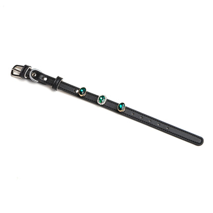 Obsidian black leather dog collar with forest green oval charms by Vanderclix&Co., angled view.