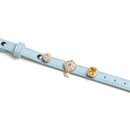 Tidal blue dog collar with diamond-cut crystal charms by Vanderclix&Co., detail view.